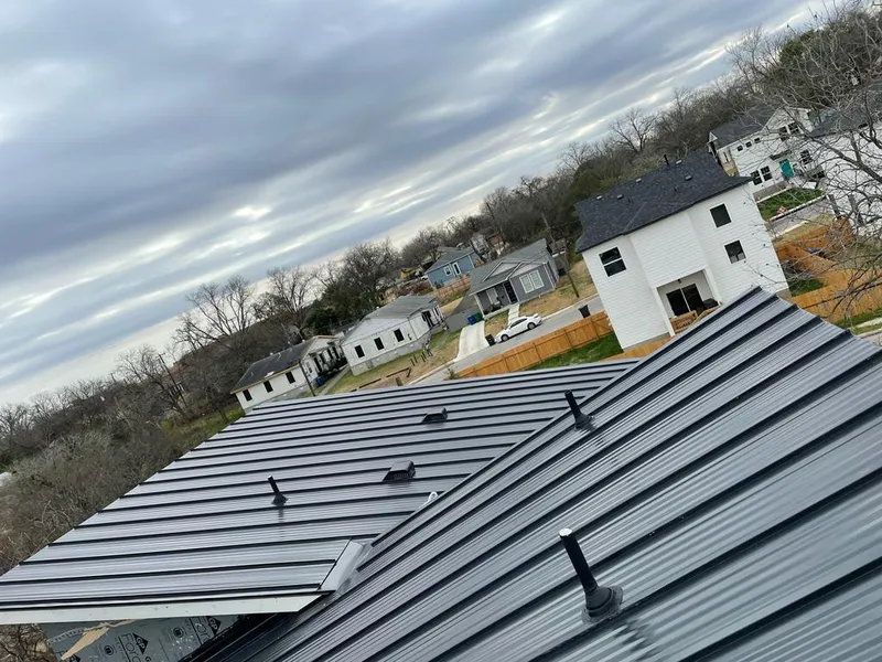 Standing seam metal roof panels with vents for Skylight Repair in Branford